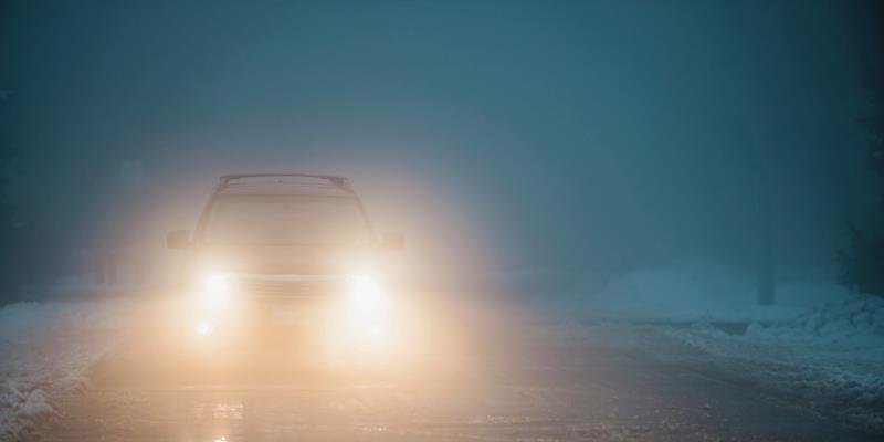 A person turning away from a shadow that grows larger behind them, symbolizing how ignoring risks makes them harder to manage.